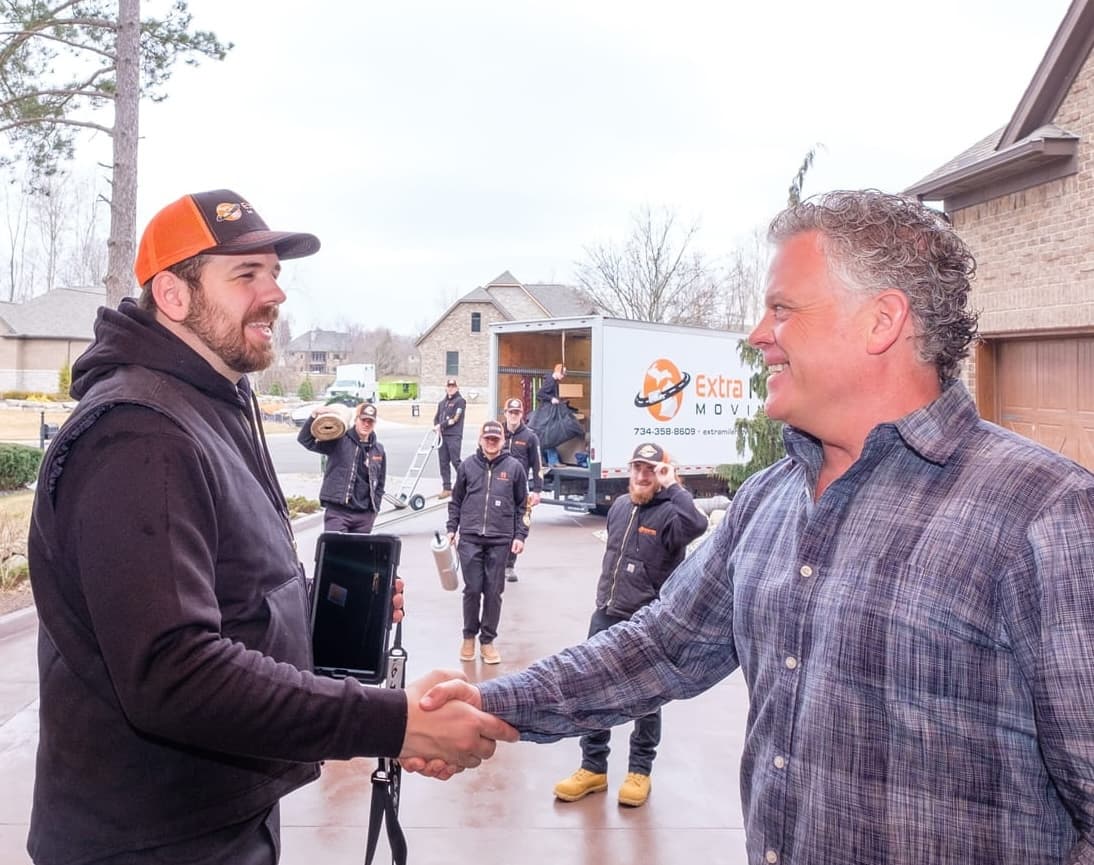 Professional movers carefully handling belongings